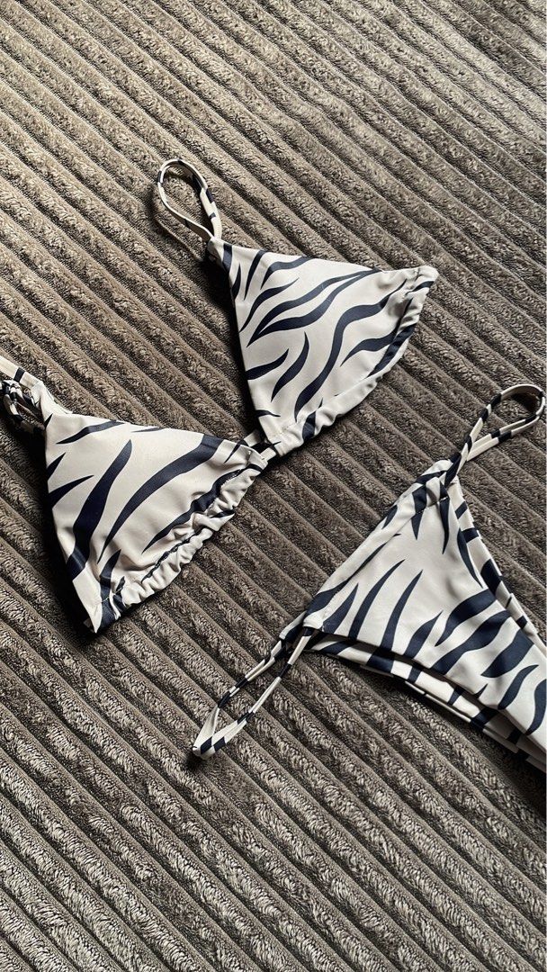 SHEIN Swim Summer Beach Zebra Stripe Bikini Set (Category: Bikinis & Swimsuits) located in Cavite. Submitted by kyrasalvad19608 (Listing ID 1460388150, Image 2). Description: - Trendy zebra print bikini set - Triangle top with adjustable straps - Color: Khaki & Black - Flaws: Used Once.