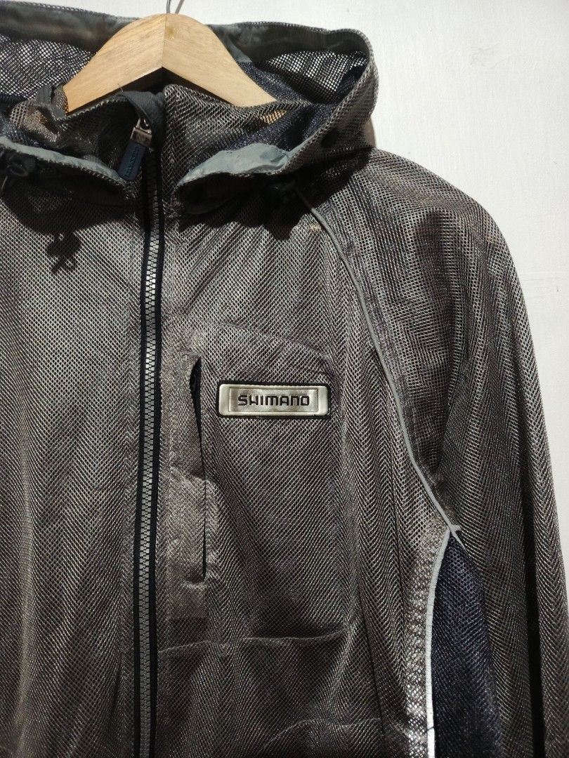 SHIMANO MESH CYCLING JACKET (Category: Coats, Jackets and Outerwear) located in Baguio. Submitted by 074thriftmania (Listing ID 1460462737, Image 3). Description: - Lightweight Shimano jacket, Size M - Breathable mesh panels for ventilation - Full zip front with hood - Chest pocket for essentials - Adjustable hem for a custom fit - Ideal for cycling and outdoor activities length 26.5" width 22".