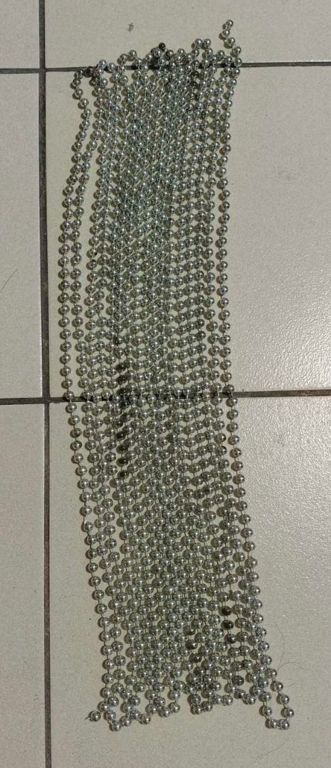 XMAS DISCOUNT!!! Silver Beaded Chain Strand for Christmas Tree or Decoration (Category: Other Home Decor) located in Quezon City. Submitted by oddduck02 (Listing ID 1460374366, Image 3). Description: - Silver-toned bead strands for Christmas Tree or Decoration - Round, uniform beads - Connected by a thin chain - L = 25ft. + 9inches - Beads are 1/4in in diameter - Reason for selling = Cleaning house - Strand has a few beads that are tarnished .