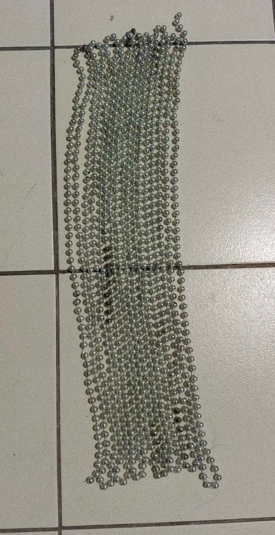 XMAS DISCOUNT!!! Silver Beaded Chain Strand for Christmas Tree or Decoration (Category: Other Home Decor) located in Quezon City. Submitted by oddduck02 (Listing ID 1460374366, Image 1). Description: - Silver-toned bead strands for Christmas Tree or Decoration - Round, uniform beads - Connected by a thin chain - L = 25ft. + 9inches - Beads are 1/4in in diameter - Reason for selling = Cleaning house - Strand has a few beads that are tarnished .