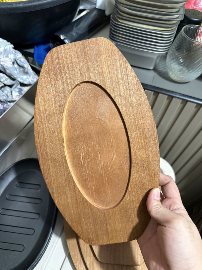 Sizzling Plate 23cm (Category: Cookware & Accessories) located in Taytay. Submitted by isaberseller (Listing ID 1460494069, Image 2). Description: For Sale: 5pcs sizzling plate iron cast with wooden tray and free iron fork. All are new and unused. Selling due to stop business. Original price: 1000 set Selling price: 900 up to 800 last price. Location: Sitio Arenda Brgy. Sta. Ana, Taytay Rizal.