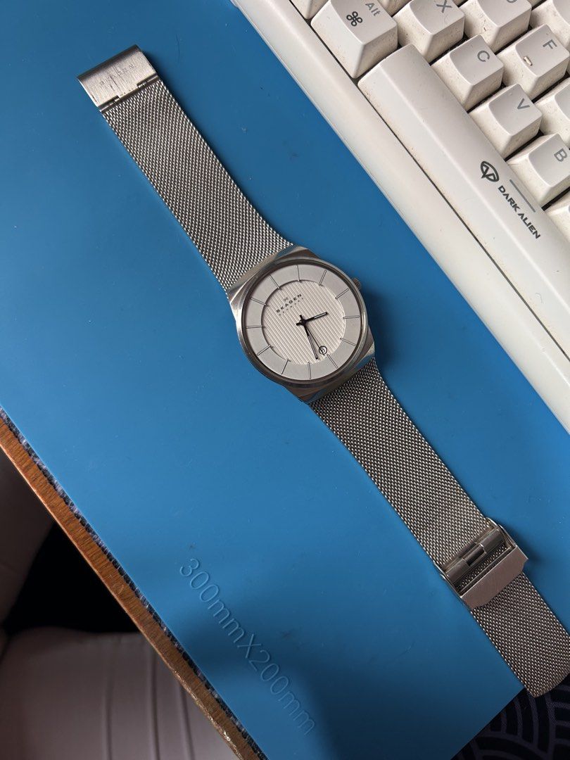 Skagen Denmark 780XLSS Mesh Strap Watch (Category: Men's Watches) located in Caloocan City. Submitted by mikeg03 (Listing ID 1460384681, Image 3). Description: - Skagen Denmark watch - Silver mesh strap - Clean white dial with silver hour markers - Date window - Stainless steel case - Hardened mineral crystal - Water resistant - Minimalist design - Ideal for everyday wear or dressing up Good working condition Keeps accurate time Minimal sign of u