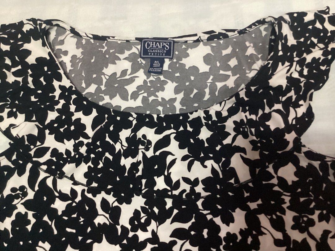 Sleeveless Top from Chaps (Category: Sleeveless) located in Davao. Submitted by ferdipt (Listing ID 1460425555, Image 2). Description: Floral print sleeveless top with round neckline and ruffled trim. Size Classic Petite. Made in Jordan 96% Polyester, 4% Elastane L:21 inches Armpit to Armpit: 18 inches .