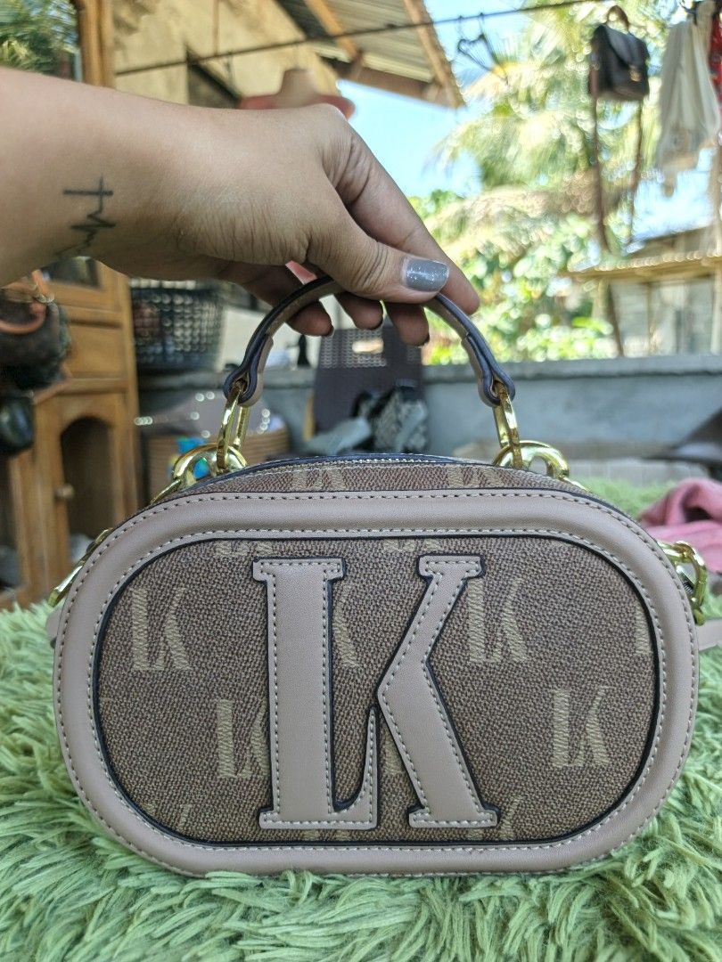 Sling bag for women (Category: Cross-body Bags) located in Manila. Submitted by ukay-ukaybylyn (Listing ID 1460307095, Image 1). Description: good as new 💯 kasya phone and adjustable strap.