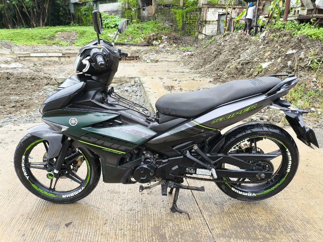 Sniper 150 Mxi 2019 model (Category: Motorbikes for Sale) located in Manila. Submitted by mjuanalaptops927 (Listing ID 1460449426, Image 1). Description: FOR SALE ONLY Sniper 150 Mxi 2019 model 66k original odo All stock engine Registered til 2027 Complete legal papers with LTO plate 2 original keys Naka power pipe, kasama na stock pipe naka stainless elbow RCB lever RCB monoshock Goods pa gulong harap at likod 48k sagad 45,000 fixed‼️ Location: 