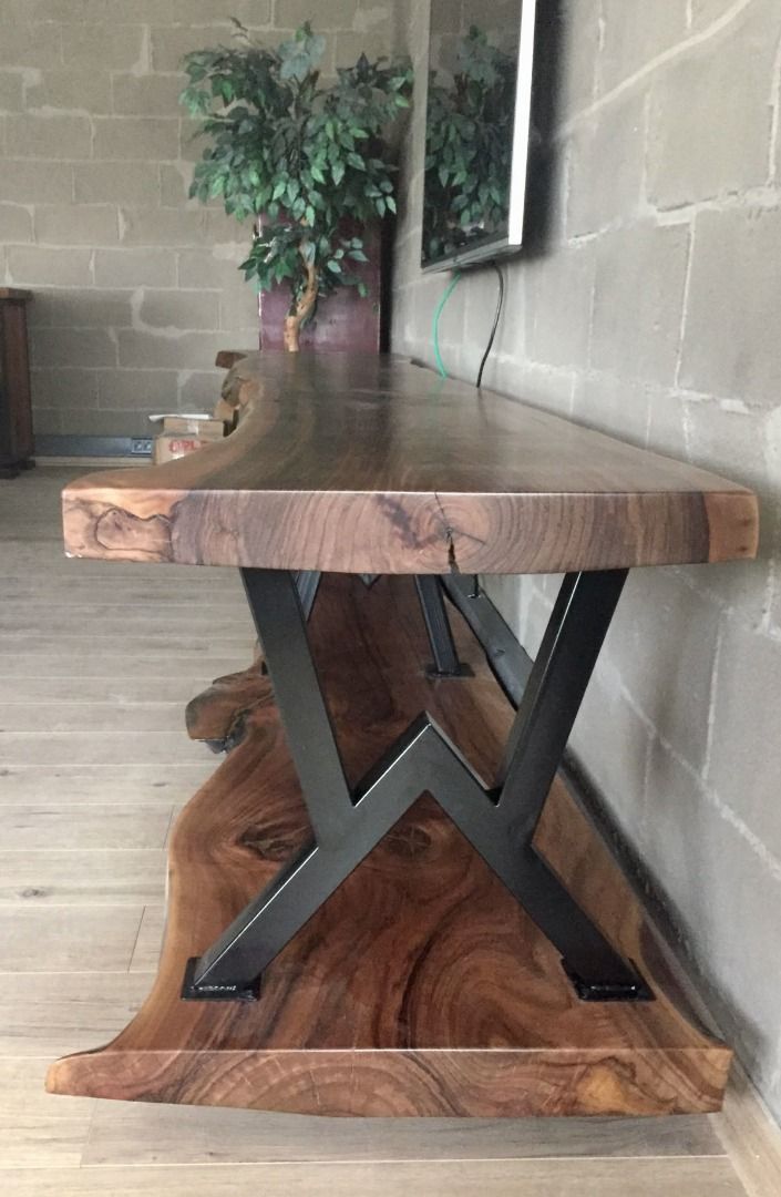 Solid Wood Live Edge Coffee Table with Shelf (Category: Tables & Sets) located in Caloocan City. Submitted by blessed0fnature (Listing ID 1460478229, Image 2). Description: - Beautiful solid wood coffee table - Unique live edge design with natural wood grain - Convenient shelf for storage - Perfect for living rooms or as a display piece - One-of-a-kind look - Dimensions: Approx. [insert length] x [insert width] x [insert height] .