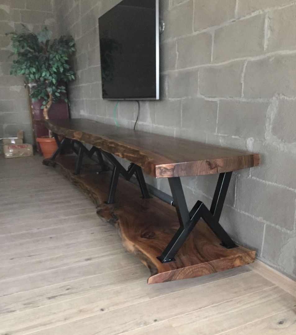 Solid Wood Live Edge Coffee Table with Shelf (Category: Tables & Sets) located in Caloocan City. Submitted by blessed0fnature (Listing ID 1460478229, Image 1). Description: - Beautiful solid wood coffee table - Unique live edge design with natural wood grain - Convenient shelf for storage - Perfect for living rooms or as a display piece - One-of-a-kind look - Dimensions: Approx. [insert length] x [insert width] x [insert height] .
