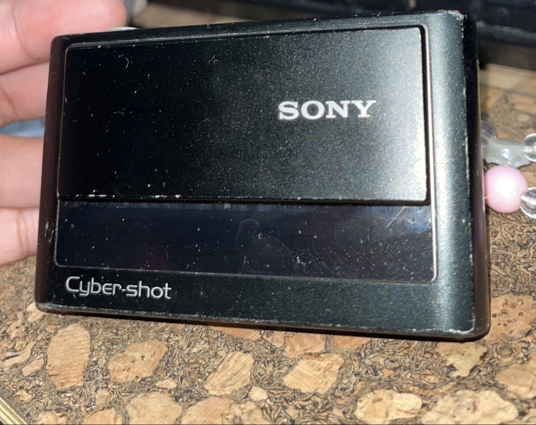 Sony Cyber-shot DSC-T20 (Category: Cameras) located in Pasig City. Submitted by hanzealbertmiguel (Listing ID 1460438247, Image 3). Description: - Black Sony Cyber-shot digital camera - Carl Zeiss Vario-Tessar lens - 3x optical zoom - Compact and portable design - Perfect for quick snapshots - Includes a cute pink beaded strap with a flower charm - PM FOR MORE PICTURES NEGOTIABLE!!.