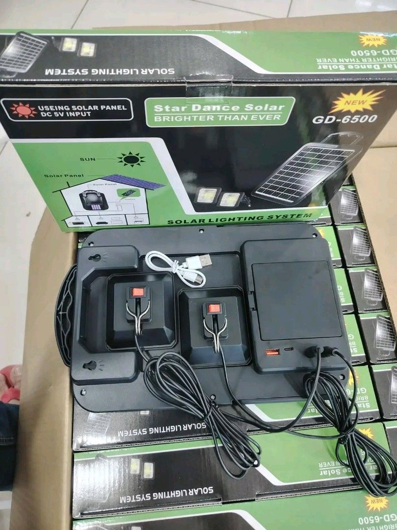 Star Dance Solar GD-6500 Solar Lighting System with Panel (Category: Lighting) located in Manila. Submitted by marvieobordo (Listing ID 1460444762, Image 3). Description: - Star Dance Solar GD-6500 Lighting System - Solar powered with DC 5V input option - Comes with 2 bright LED lights - Includes solar panel and cables - Ideal for outdoor lighting solutions.