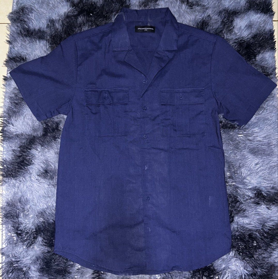 Straightforward Navy Blue Short Sleeve Button Up Shirt (Category: Tshirts & Polo Shirts ) located in Manila. Submitted by bootsywootsy (Listing ID 1460473188, Image 1). Description: - Navy blue short sleeve shirt - Brand: Straightforward - Size: Large - Two chest pockets with button closures - Classic collar - Ideal for casual wear or layering.