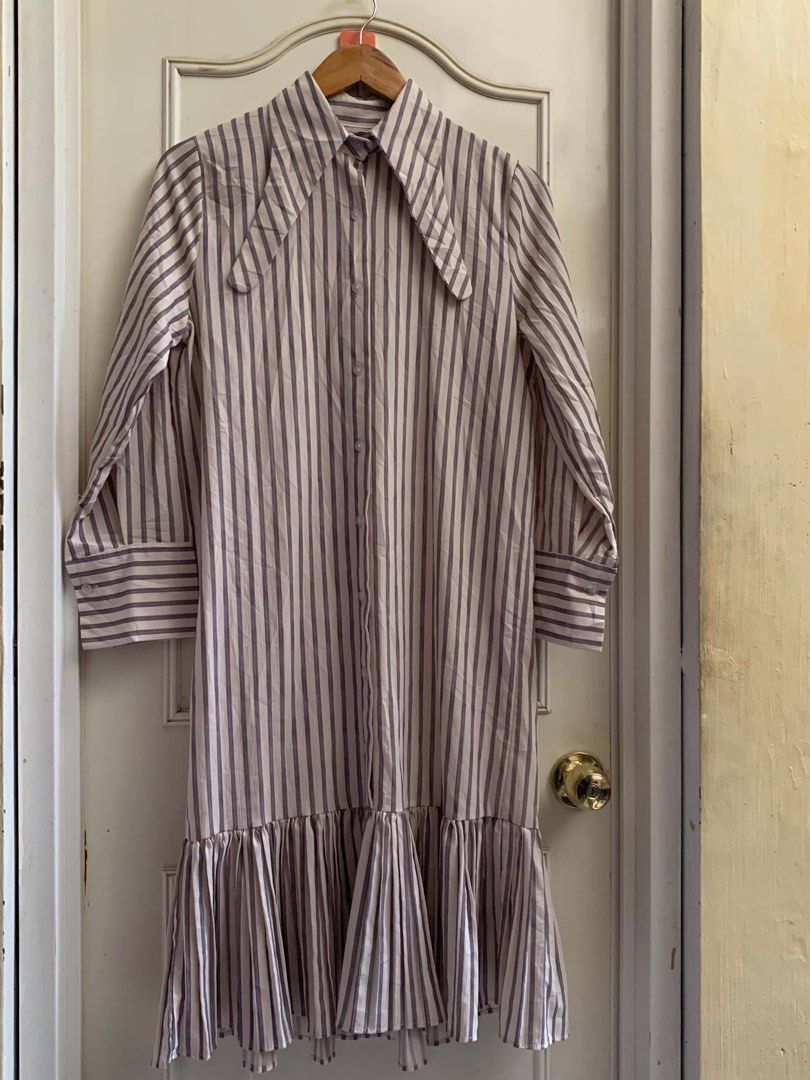 SUPER SALE🔥Striped Button-Up Midi Dress with Ruffle Hem Medium-Semi L (Category: Dresses) located in Calapan. Submitted by shakalak (Listing ID 1460453095, Image 3). Description: - Classic pinstripe long-sleeved midi dress - Features a prominent collar - Ruffled hemline for a feminine touch - Easy button-up front - Perfect for dressing up or down, suitable for casual outings or formal occasions -19x41.