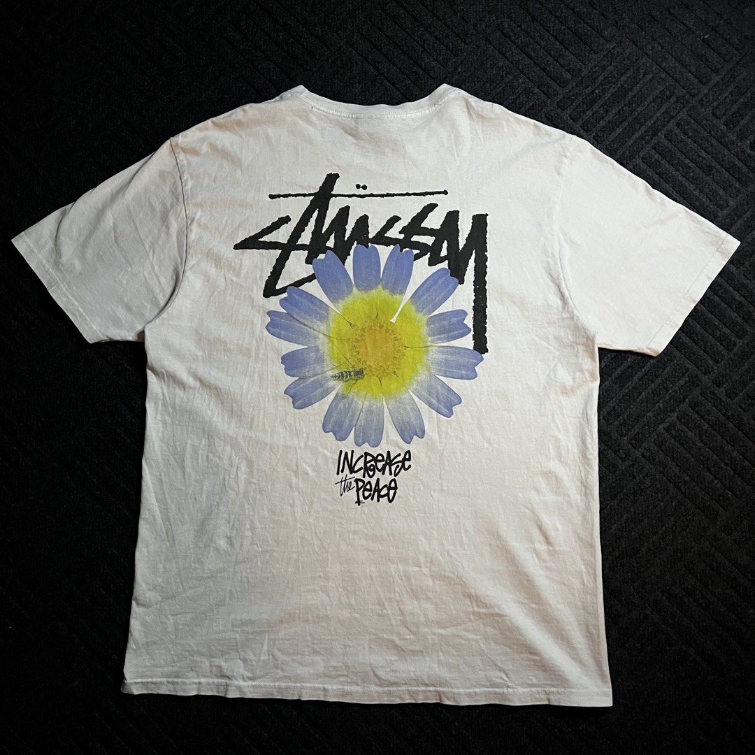 Stussy Increase Peace Flower (Category: Tshirts & Polo Shirts ) located in Davao. Submitted by archived.status (Listing ID 1460484578, Image 3). Description: COLOR MAY VARY DUE TO LIGHTING‼️ Condition: 9.5/10 Color rate: 9.5/10 Issue: last pic, and minimal stain as dirty white Size Large fit X-Large Width 22 Length 29.