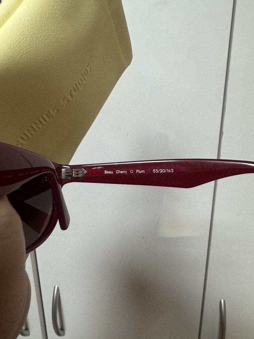 Sunnies Beau in Cherry (Category: Sunglasses & Eyewear) located in Manila. Submitted by quintessesommerset (Listing ID 1460500652, Image 2). Description: - Brand: Sunnies Studio - Model: Beau Cherry O Plum - Frame Color: Deep cherry red, almost plum - Includes: Soft yellow pouch - Style: Great for everyday wear or as a statement piece.