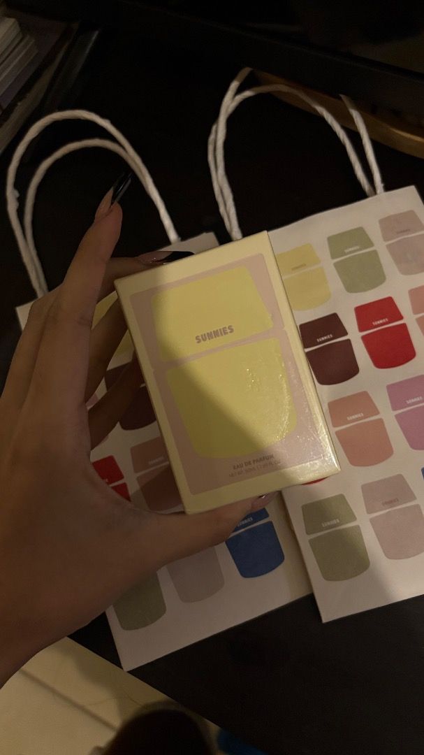 Sunnies Eau de Parfum yellow (Category: Fragrance & Deodorants) located in Taguig. Submitted by imeverywhereimsellahhhh (Listing ID 1460479178, Image 1). Description: - Brand new sunnied perfume - Scent: yellow - Unopened and sealed - Includes cute box, shopping bag, and stickers - Ideal for gifting or personal use.