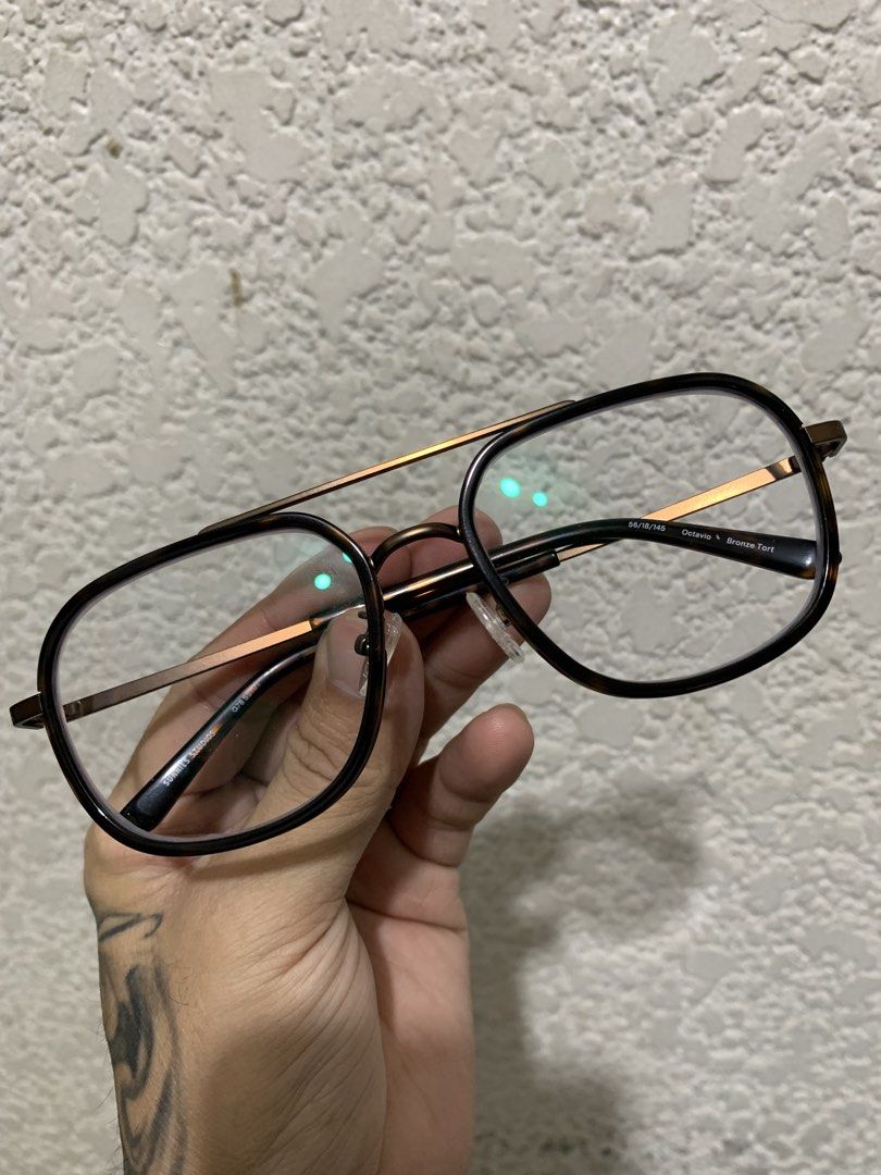 Sunnies Studios Octavia Bronze Tort Aviator Eyeglasses (Category: Sunglasses & Eyewear) located in Cebu City. Submitted by nieladam26 (Listing ID 1460321464, Image 1). Description: - Sunnies Studios Octavia eyeglasses -100 USED ONCE ONLY - Color: Bronze Tort - Style: Aviator with black rim and bronze accents - Frame Size: 54/19-145 - Includes original case - Prescription details available in photos - Recently purchased.