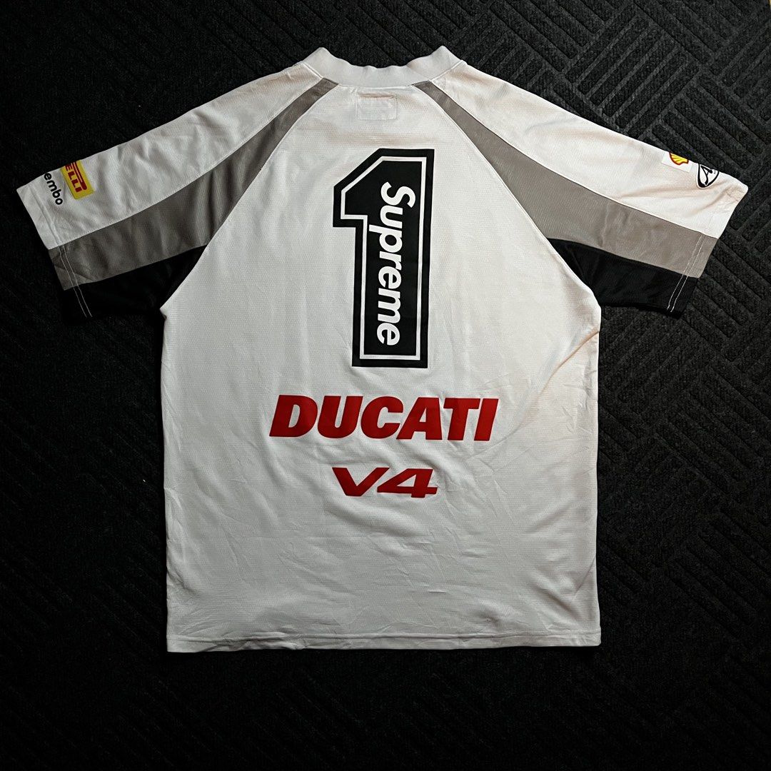 Supeme X Ducati Socce Jersey (Category: Tshirts & Polo Shirts ) located in Davao. Submitted by archived.status (Listing ID 1460483233, Image 3). Description: COLOR MAY VARY DUE TO LIGHTING‼️ Condition: 9.5/10 Color rate: 9.5/10, or better Issue: minimal stain for safe as white, and pinhole repairable see last pic Size Medium fit Large Width 22 Length 28.