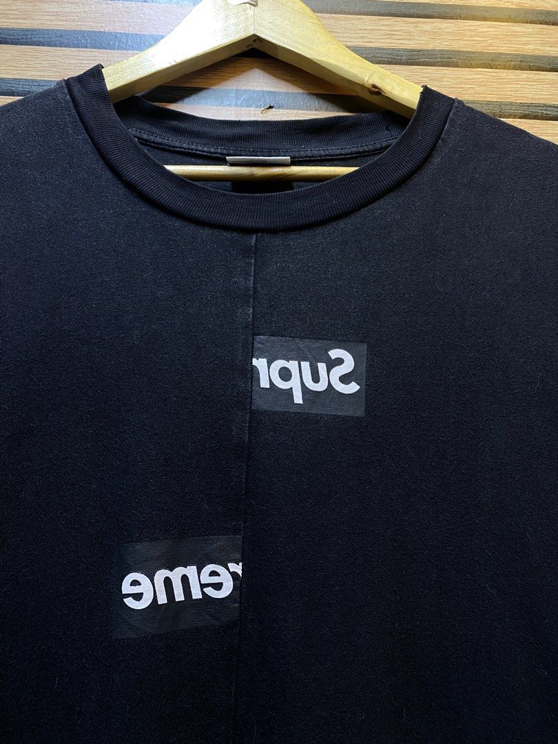 Supreme X Comme Des Garcons “Split bogo” (Category: Tshirts & Polo Shirts ) located in Makati City. Submitted by drip.poww (Listing ID 1460418738, Image 3). Description: - Authentic Supreme x Cdg - Color: Black - Size: Large - Dimes: 23x29 - Authentic - Excellent condition - Need wash, fresh from bale - Material: 100% Cotton Please don’t expect too much—these are thrifted (ukay) items. 😊 !!STILL NEGOTIABLE!!.