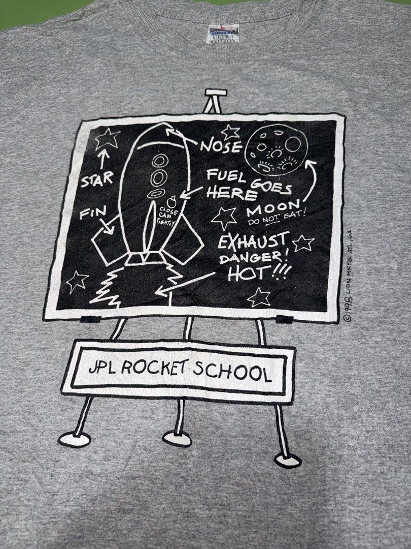 T Shirt (Category: Tshirts & Polo Shirts ) located in Pasig City. Submitted by reyeslarry11740 (Listing ID 1460330123, Image 2). Description: For Sale Gildan Ultra Cotton Heavyweight JPL Rocket School 1998 Graphic Size Medium 19.8w x 27.7L Very good condition Issue normal hairline print, need wash, see last picture 400 plus ship only Payment 1st Pasig city .