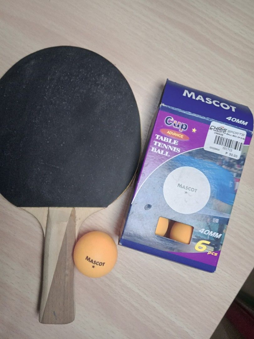 Table Tennis Paddle & Balls (Category: Other Sports Equipment and Supplies) located in San Fernando. Submitted by _luxielleph (Listing ID 1460493285, Image 2). Description: ✅️NEGOTIABLE - Set includes 6 orange Mascot 40mm table tennis balls. - Also includes 1 Giant Dragon Shooter 2 Star table tennis paddle. - Paddle features red on one side and black on the other. - Ideal for casual games and practice sessions. ***Used twice in school P.E. Paddle