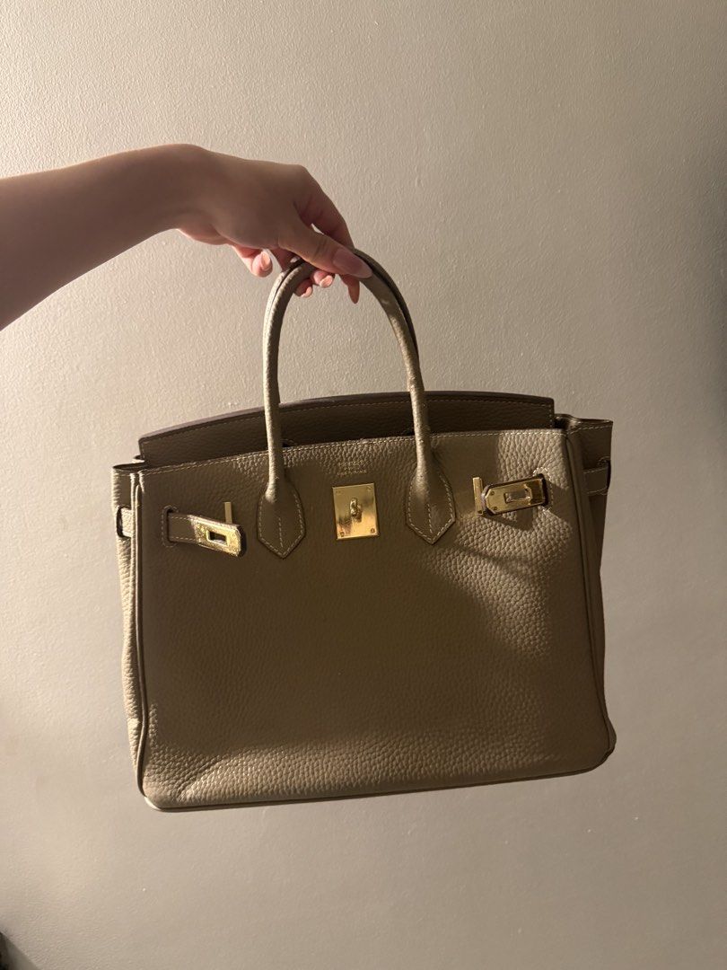 Taupe Bag (Category: Purses & Pouches) located in Makati City. Submitted by florencedoll (Listing ID 1460500420, Image 3). Description: Overall bag is sturdy and structured strong, only defects are there are faded patches, but only a few. Still a pretty and elegant choice.