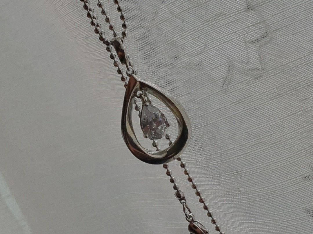 Teardrop Zirconia Necklace (Category: Necklaces) located in Quezon City. Submitted by WasalakTwo (Listing ID 1460304894, Image 3). Description: Bought in Japan High quality Goocondition Clean and presentable 44cm Open for delivery nationwide.