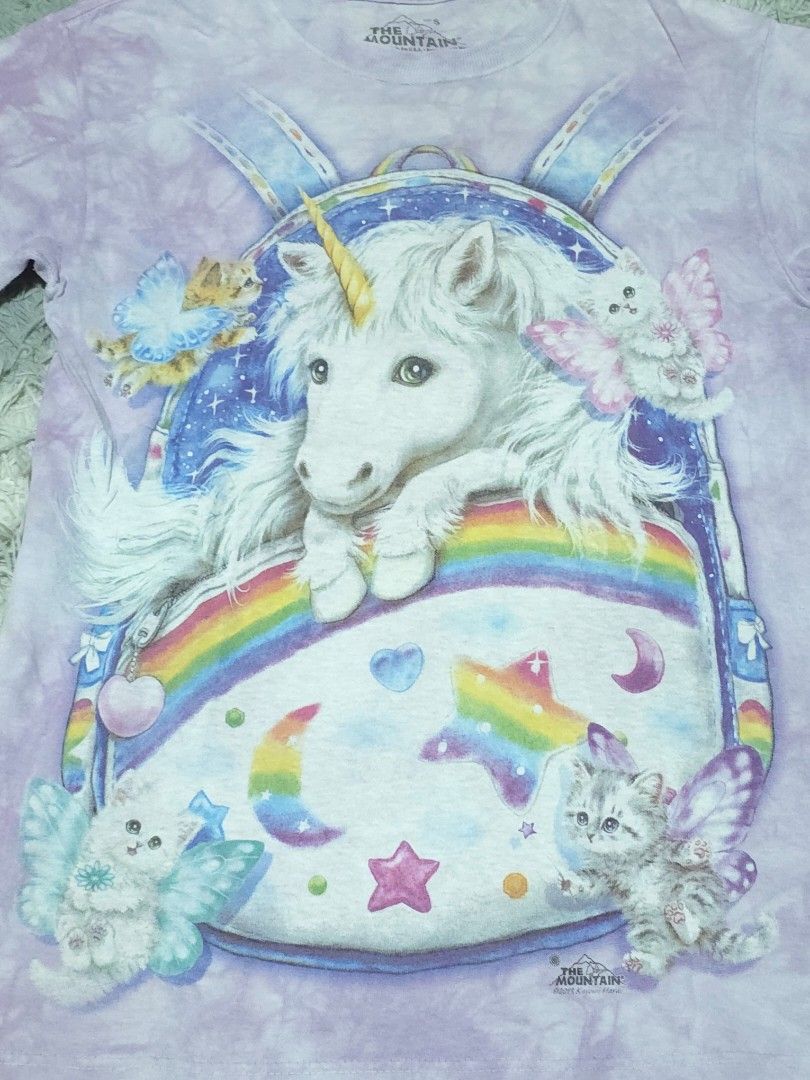 The Mountain (Category: Tshirts & Polo Shirts ) located in Abulug. Submitted by humanwhosellthings (Listing ID 1460400610, Image 2). Description: THE MOUNTAIN Unicorn Tee ✅️Size: Small ✅️Dimes: 18W x 27L ✅Condition: Excellent ✅Issue: may maliit na distress sa neckline ✅Color Rate: 9.5/10.