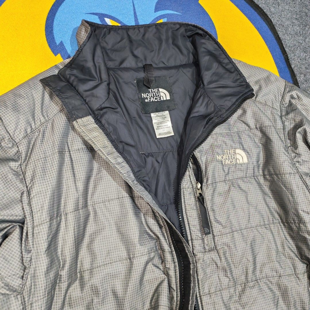 The North Face Insulated Puffer Jacket (Category: Activewear) located in Santa Rosa. Submitted by vann26 (Listing ID 1460441139, Image 3). Description: The North Face Insulated Puffer Jacket🔥 Size: Large on tag Dimes: 24-25W x 27L Condition: Excellente Color Rate: 9/10 Gray Colorway Lightweight Mountaineering/Travel/Winter Stow Pocket/Packable Issues/Wash only Via: J&T/Lalamove Loc: Laguna Mop: Gcash/Payment First 1,980 only💸 noon.