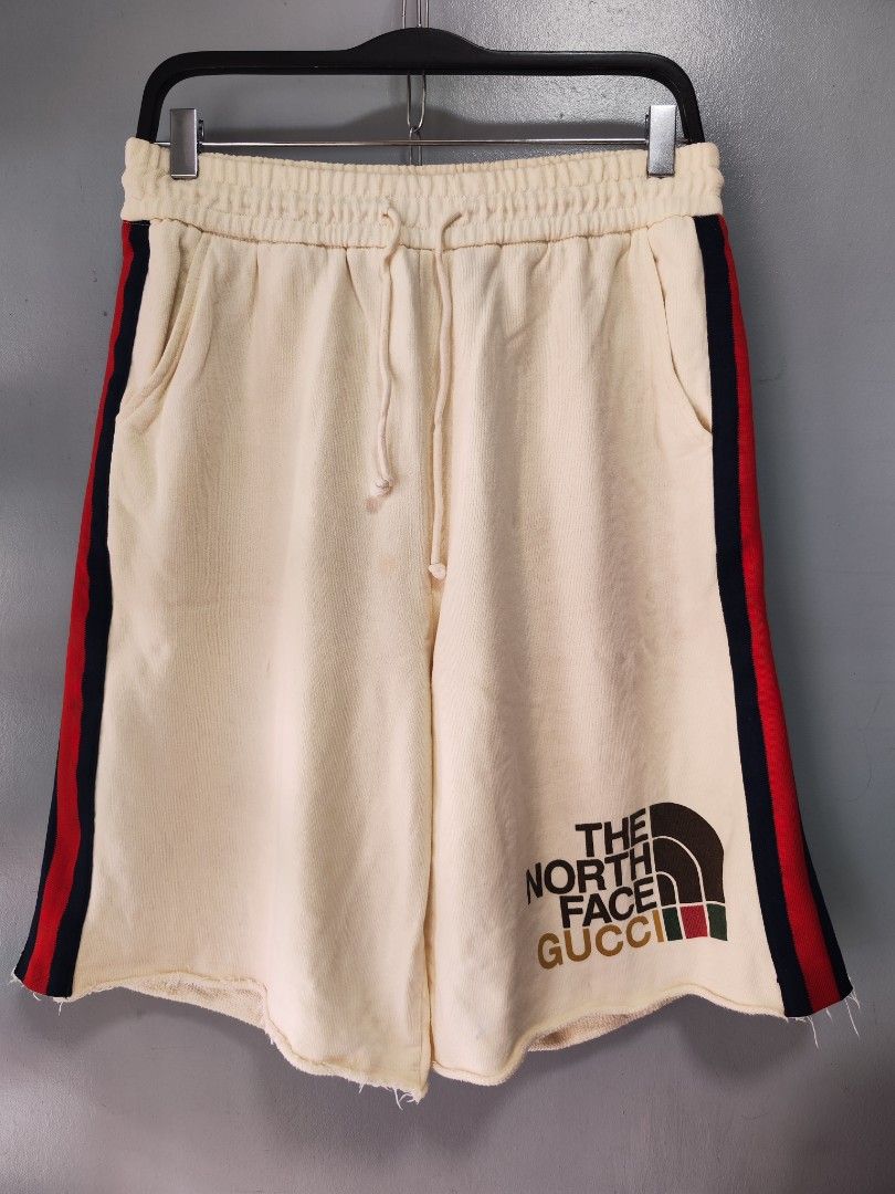 The North Face X Gucci Shorts (Category: Shorts) located in Bulacan. Submitted by emilj23 (Listing ID 1460428472, Image 1). Description: The North Face X Gucci Shorts Size L on tag L 22 W 30-36 Leg Hole 13.5 Condition 9/10 Color rate 9/10 Issue Multiple Stains.