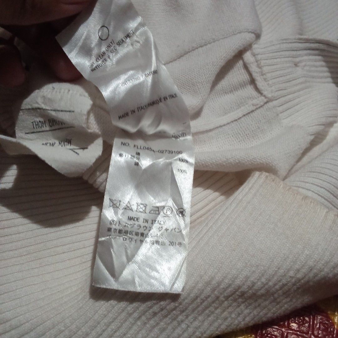 Thom Browne (Category: Longsleeves) located in Manila. Submitted by tcbukay_zxc25 (Listing ID 1460459182, Image 3). Description: Thom Browne kinnted long sleeve size 1 issue stain need wash zonrox.nyo na white.