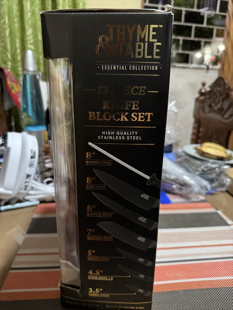 Thyme & Table 13-Piece Knife Block Set - Stainless Steel (Category: Other Kitchenware & Tableware) located in Caloocan City. Submitted by rodelramos.rivera (Listing ID 1460427526, Image 3). Description: - Complete 13-piece knife block set from Thyme & Table - High-quality stainless steel blades for durability and sharpness - Ergonomic handles for a comfortable and secure grip - Stylish matte black non-stick coating - Includes: Honing steel, Chef 