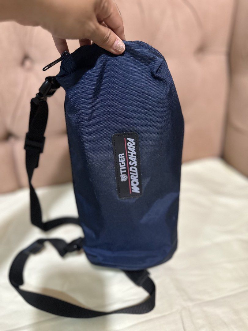 Tiger Bottle Holder Nylon Sling Bag (Category: Food Organization & Storage) located in Davao. Submitted by favoritepreloved (Listing ID 1460437084, Image 2). Description: 💜 25cm height x 11cm x 12cm.