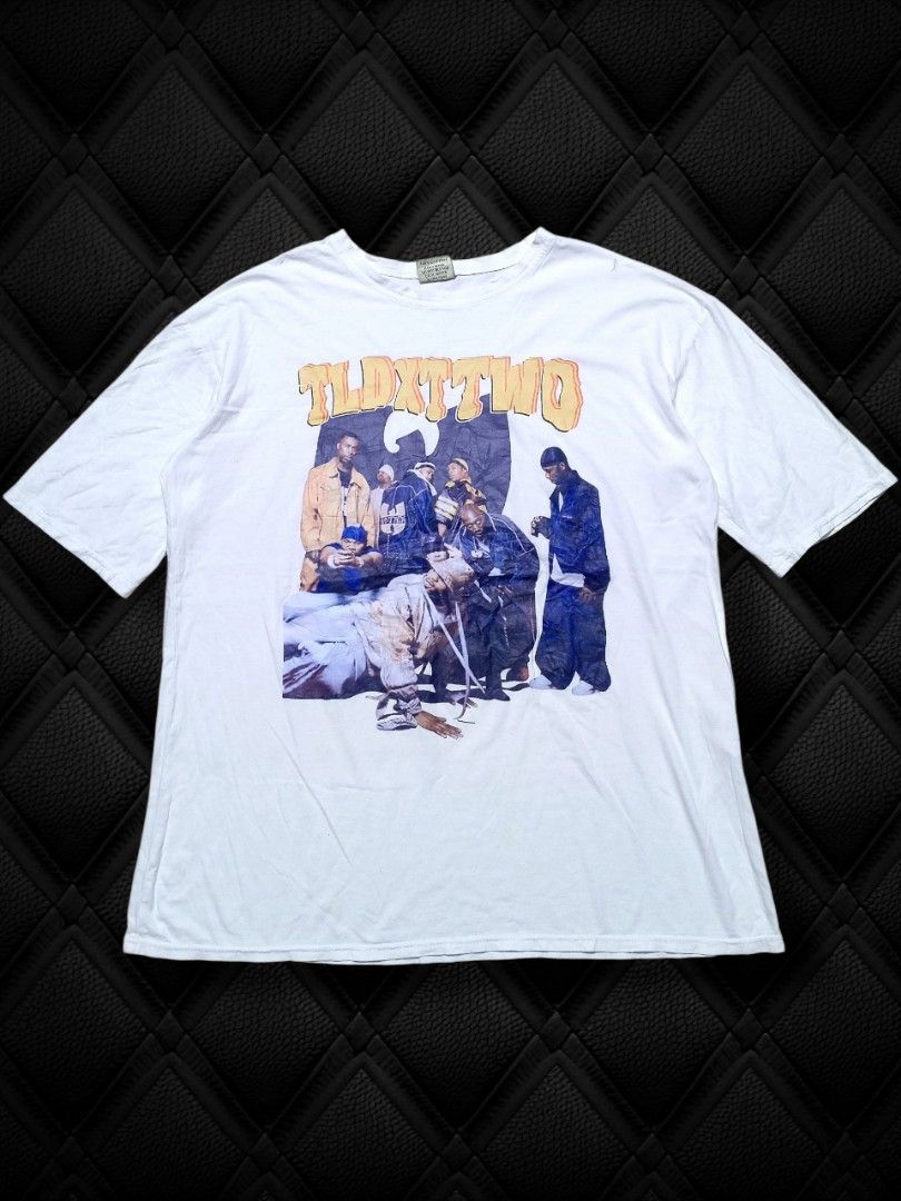TLDXTTWO White T-Shirt with Graphic Print (Category: Shirts) located in Aguinaldo. Submitted by baguioukayukay2600 (Listing ID 1460347044, Image 1). Description: - White graphic t-shirt - Features 'TLDXTTWO' text and a distressed graphic of people - Vintage, worn-in look - Ideal for casual wear.