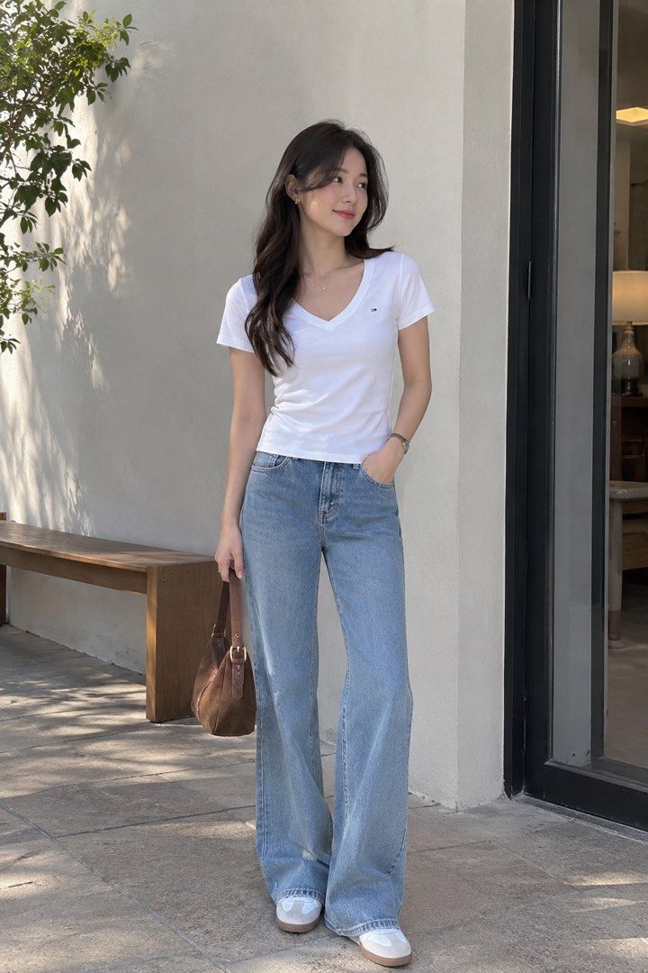 Tommy Hilfiger Basic White V-Neck T-Shirt (Category: Shirts) located in Pasig City. Submitted by shopwithelle__ (Listing ID 1460491024, Image 1). Description: - Classic white V-neck t-shirt - Brand: Tommy Hilfiger - Material: Soft cotton - Detail: Small logo on the chest - Size: S/P (Small/Petite) (fits upto med) - Versatile basic for any outfit.