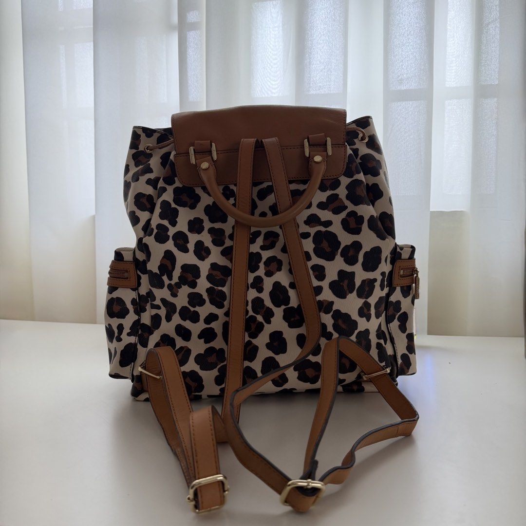 (FREE SHIPPING) Tory Burch Kerrington Leopard Print Backpack (Category: Shoulder Bags) located in Las Pinas. Submitted by francesca.finds (Listing ID 1460418658, Image 3). Description: FREE SHIPPING within metro manila.
