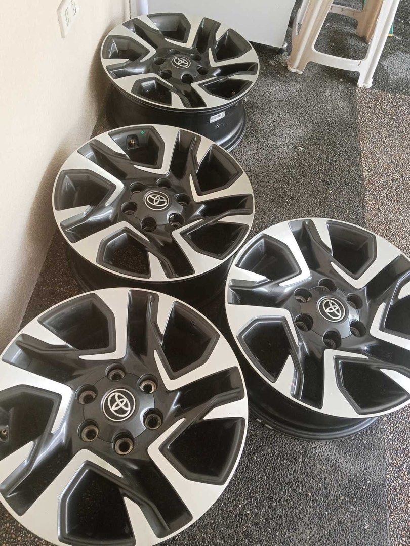 Toyota Mag wheels (Category: Mags and Tires) located in Caloocan City. Submitted by authinthecity (Listing ID 1460389620, Image 1). Description: offer to sell⚙️ Pre loved 18-inch Toyota Fortuner Legender OEM alloy wheel with a machined grey and silver finish. Wheel Specifications Size: 18 inches PCD (Pitch Circle Diameter): 6x139.7 (6-lug) Width: 7.5J Offset: ET30 Finish: Machined Grey/Silver with diamond-cut face Compatibility: Fits Toyota Fortu