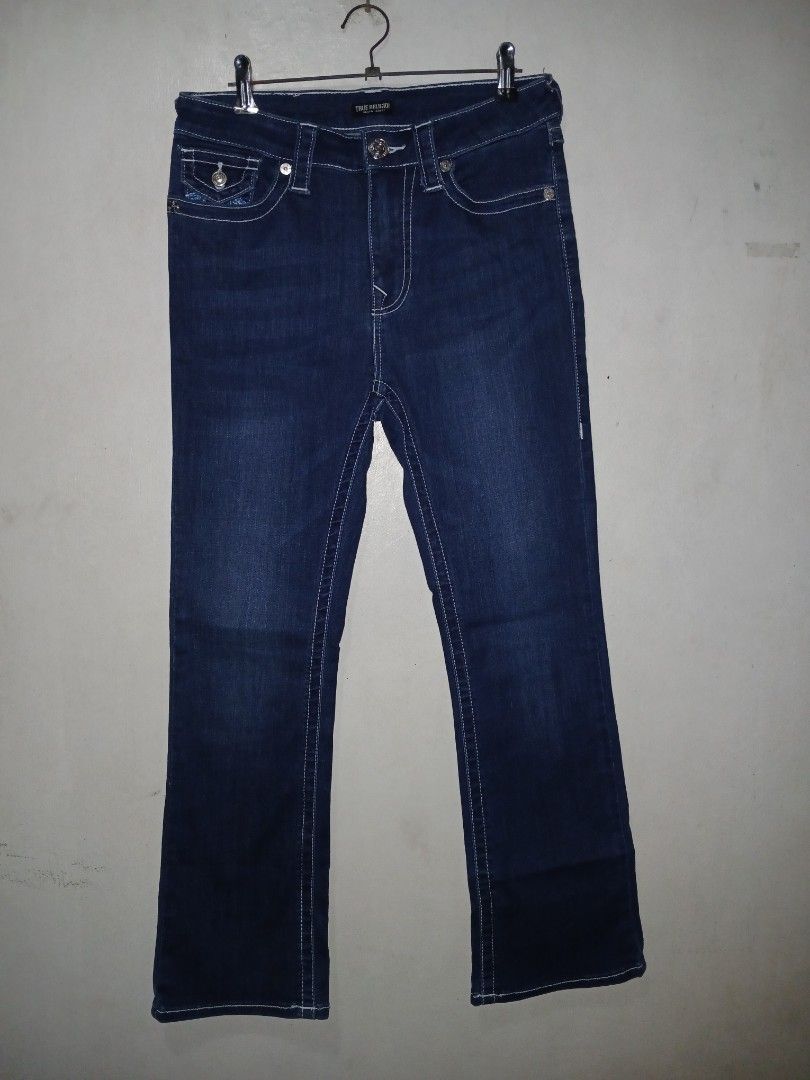 True Religion Dark Wash Denim Jeans (Category: Jeans) located in Manila. Submitted by ninshok (Listing ID 1460453713, Image 1). Description: - Authentic True Religion Jeans - Dark Wash Denim - Classic White Stitching Detail - Signature Back Pocket Design - Size: 27 - Made in Vietnam - Ideal for Everyday Wear.