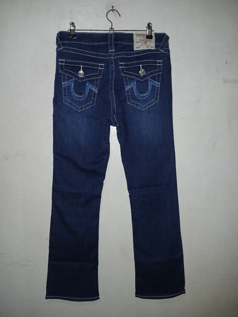 True Religion Dark Wash Denim Jeans (Category: Jeans) located in Manila. Submitted by ninshok (Listing ID 1460453713, Image 2). Description: - Authentic True Religion Jeans - Dark Wash Denim - Classic White Stitching Detail - Signature Back Pocket Design - Size: 27 - Made in Vietnam - Ideal for Everyday Wear.