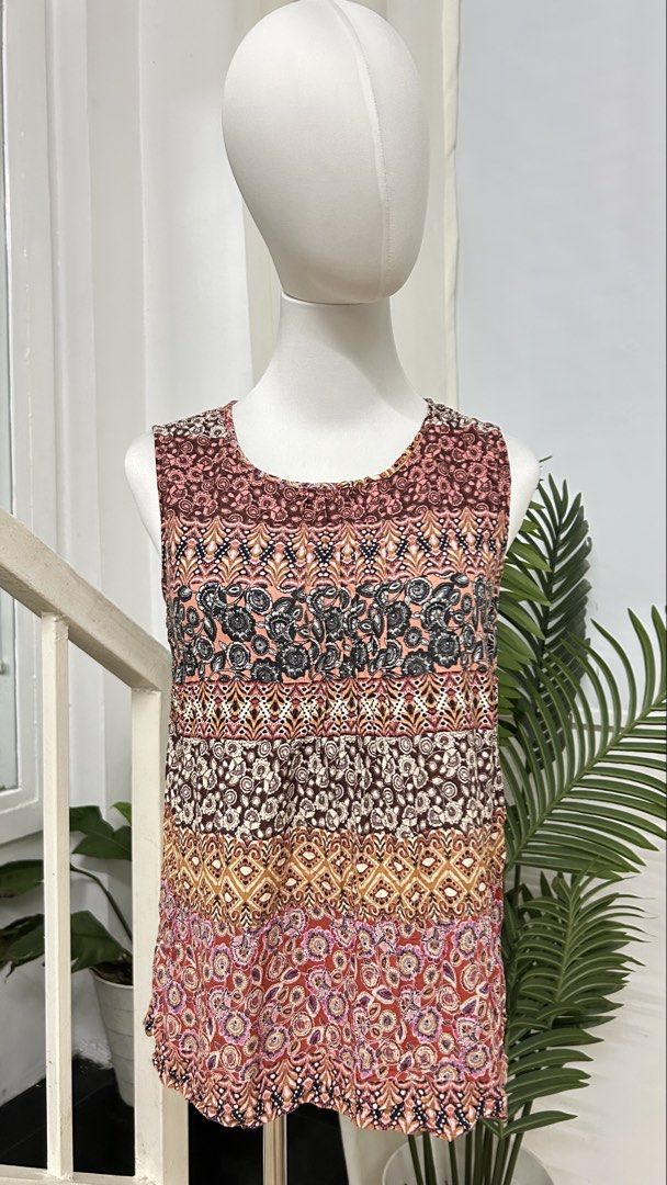 Tu UK 100% Viscose Patchwork Boho Print Sleeveless Top | S-M (Category: Sleeveless) located in San Jose del Monte. Submitted by vanessabarredo (Listing ID 1460438832, Image 3). Description: Pretty Tu sleeveless blouse in a warm mixed bohemian/patchwork floral print. Made from 100% viscose, giving it a lightweight, soft and flowy feel. Features a round neckline with subtle gathered detailing at the front. Condition: GOOD Please expect normal signs