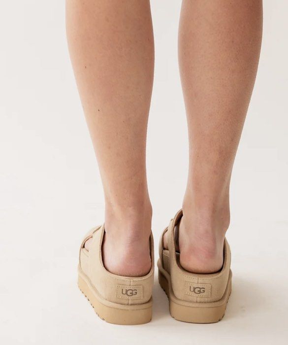 UGG Fluff Yeah Slide Sandals Tan Suede Size 9 (Category: Flats & Sandals) located in Baguio. Submitted by workwear2600 (Listing ID 1460485773, Image 2). Description: - Tan suede UGG slides - Open toe design - Platform sole for added comfort and style - Easy slip-on for everyday wear - Ideal for summer.