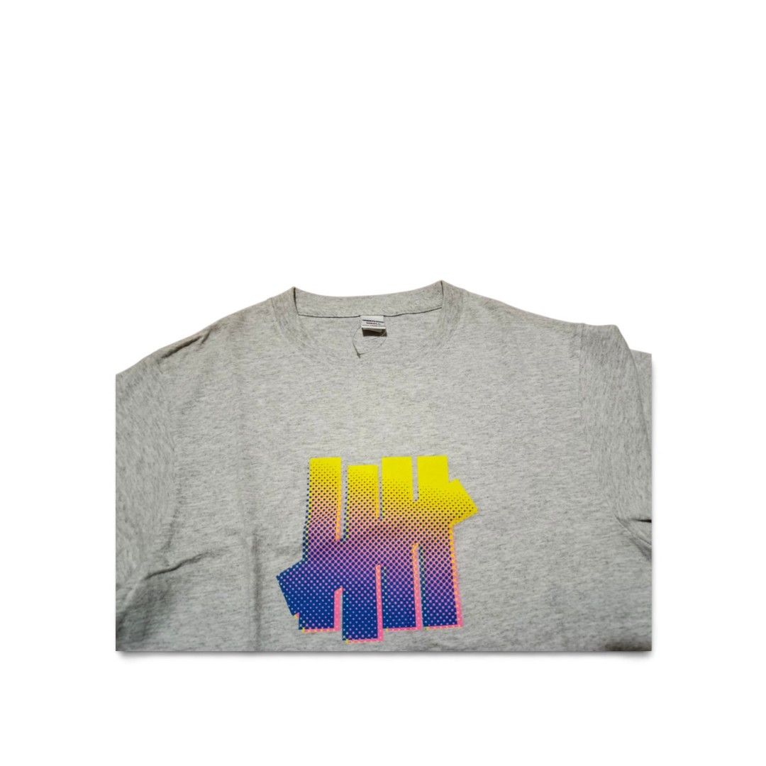 Undefeated Gradient Logo Shirt (Category: Tshirts & Polo Shirts ) located in Manila. Submitted by southstreethub.ph (Listing ID 1460429262, Image 2). Description: - Undefeated Gradient Logo Shirt - Condition: Very Good Condition - Size: Small - Dimention: 19W 27L - Design: Classic Undefeated logo graphic on the front - Price: 499.