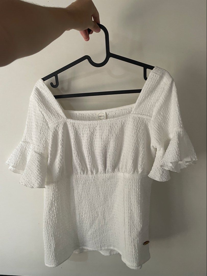 Unica Ruffled Short Sleeve Blouse - Whimsical & Chic (Category: Blouses) located in Bacolod City. Submitted by fka.tims (Listing ID 1460441141, Image 2). Description: Selling at LESS THAN HALF PRICE 🌟 BRAND NEW Local Brand, Perfect Condition, Breezy Fabric. Perfect for a sunny day ☀️ Measurements in Photos 📸 No when worn pics sorry.