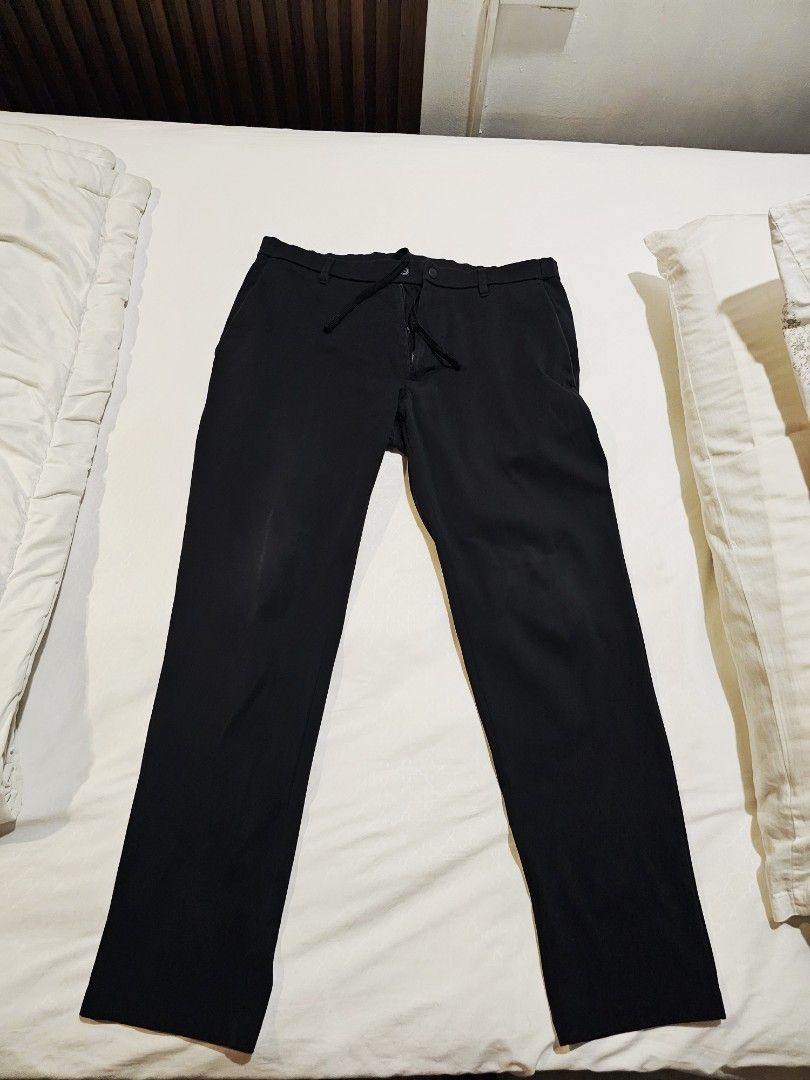 Uniqlo Black Polyester Pants Size M (Category: Trousers) located in Makati City. Submitted by richpaul_ (Listing ID 1460434827, Image 1). Description: - Brand: Uniqlo - Color: Black - Material: 100% Polyester - Size: M (fits waist 76-84cm) - Features: Drawstring waist, Straight leg cut - Style: Versatile for casual or smart casual outfits, easy to pair with any top..