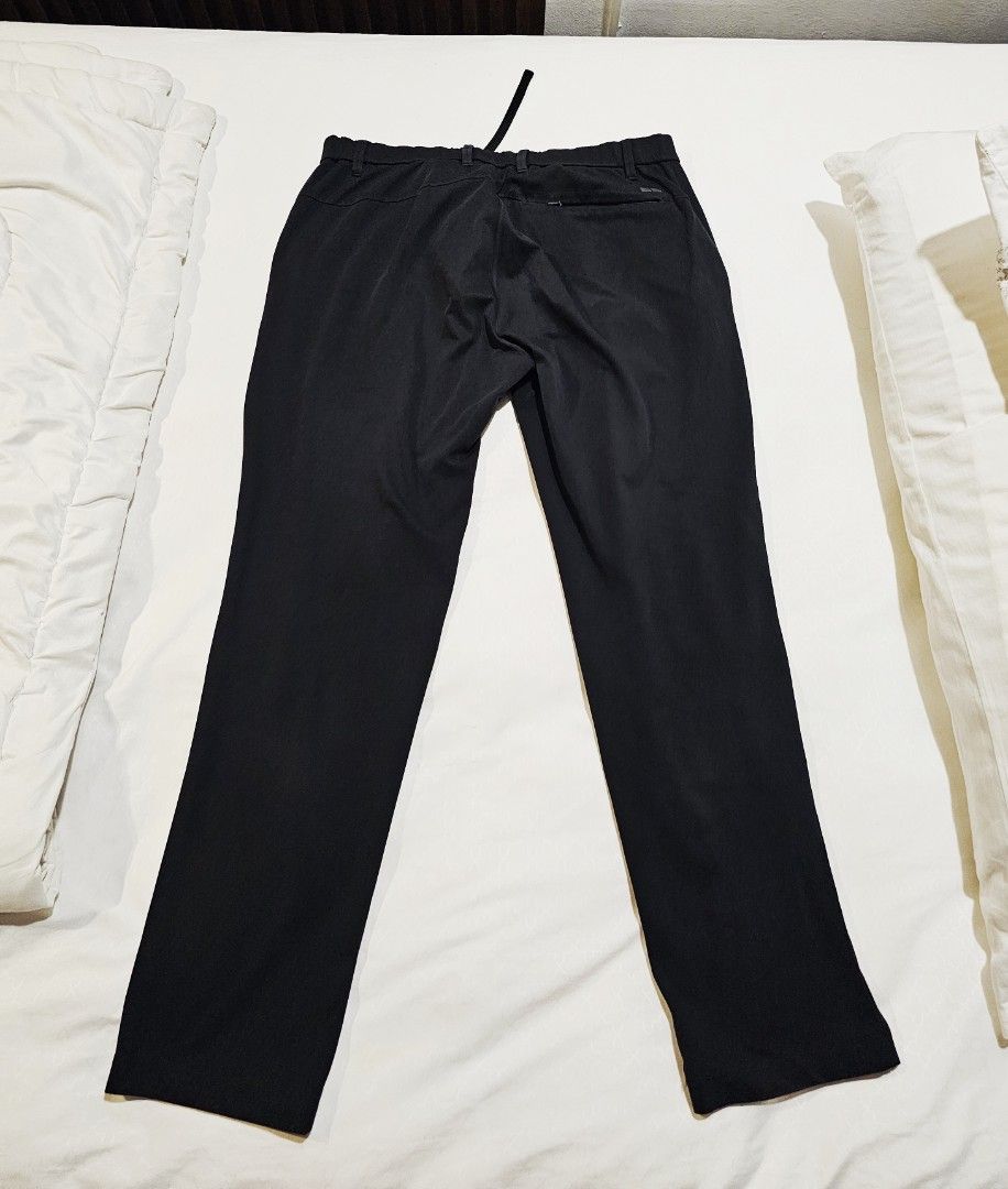 Uniqlo Black Polyester Pants Size M (Category: Trousers) located in Makati City. Submitted by richpaul_ (Listing ID 1460434827, Image 2). Description: - Brand: Uniqlo - Color: Black - Material: 100% Polyester - Size: M (fits waist 76-84cm) - Features: Drawstring waist, Straight leg cut - Style: Versatile for casual or smart casual outfits, easy to pair with any top..