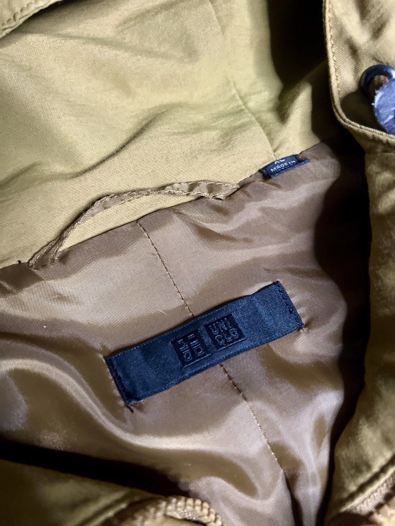 Uniqlo Khaki Hooded Utility Jacket (Category: Coats, Jackets and Outerwear) located in Tacloban City. Submitted by thrftg (Listing ID 1460464477, Image 2). Description: - Uniqlo Khaki Hooded Jacket - Size: XL - Multiple front pockets - Drawstrings on the hood - Adjustable cuffs - Ideal for everyday wear.