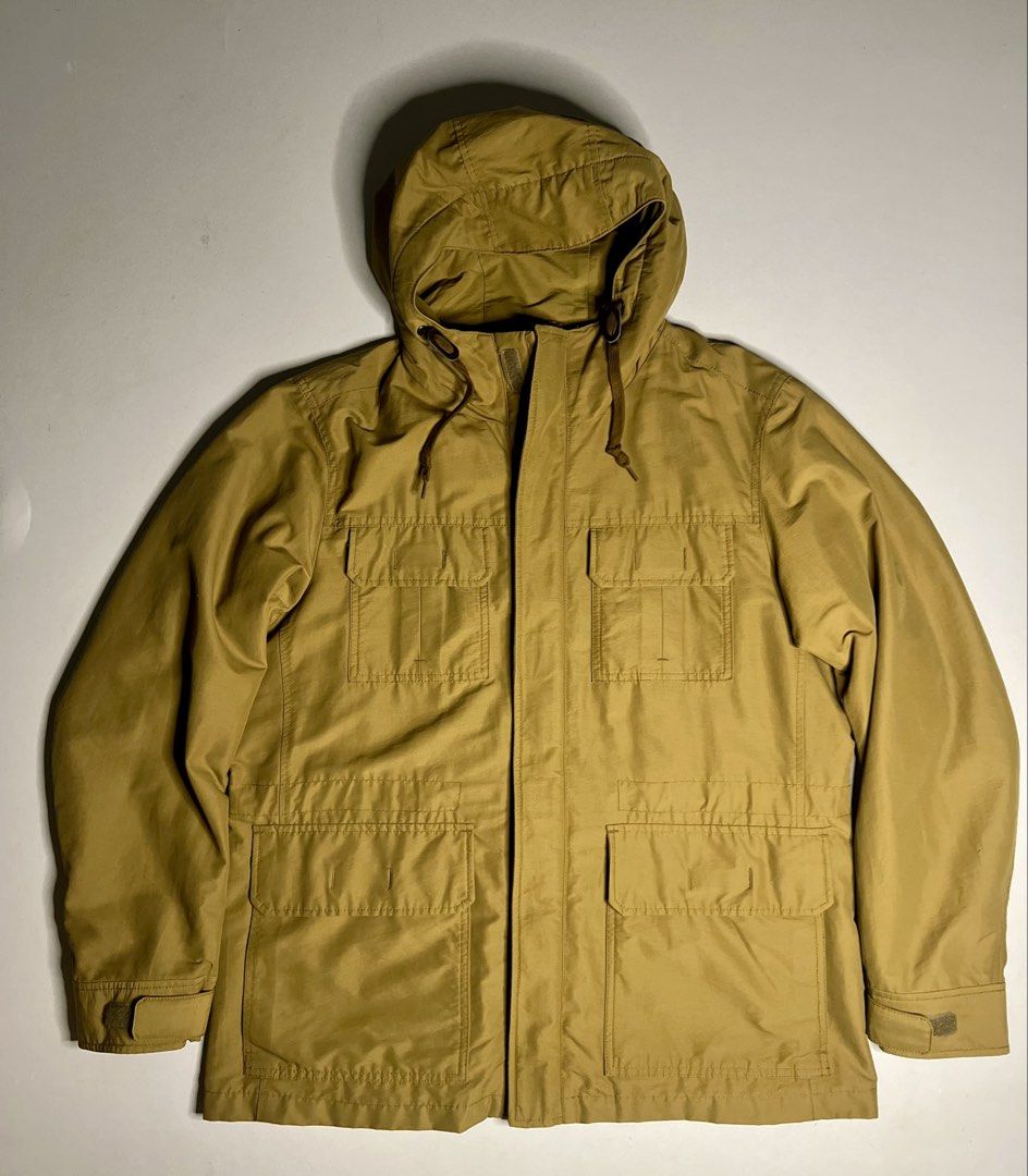 Uniqlo Khaki Hooded Utility Jacket (Category: Coats, Jackets and Outerwear) located in Tacloban City. Submitted by thrftg (Listing ID 1460464477, Image 1). Description: - Uniqlo Khaki Hooded Jacket - Size: XL - Multiple front pockets - Drawstrings on the hood - Adjustable cuffs - Ideal for everyday wear.