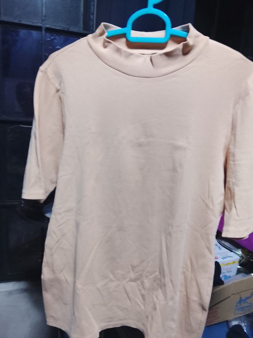 Uniqlo Turtle Neck (peachcolor) (Category: Blouses) located in Quezon City. Submitted by inah_0405 (Listing ID 1460501977, Image 1). Description: almost new used once body fit medium to.large frame.