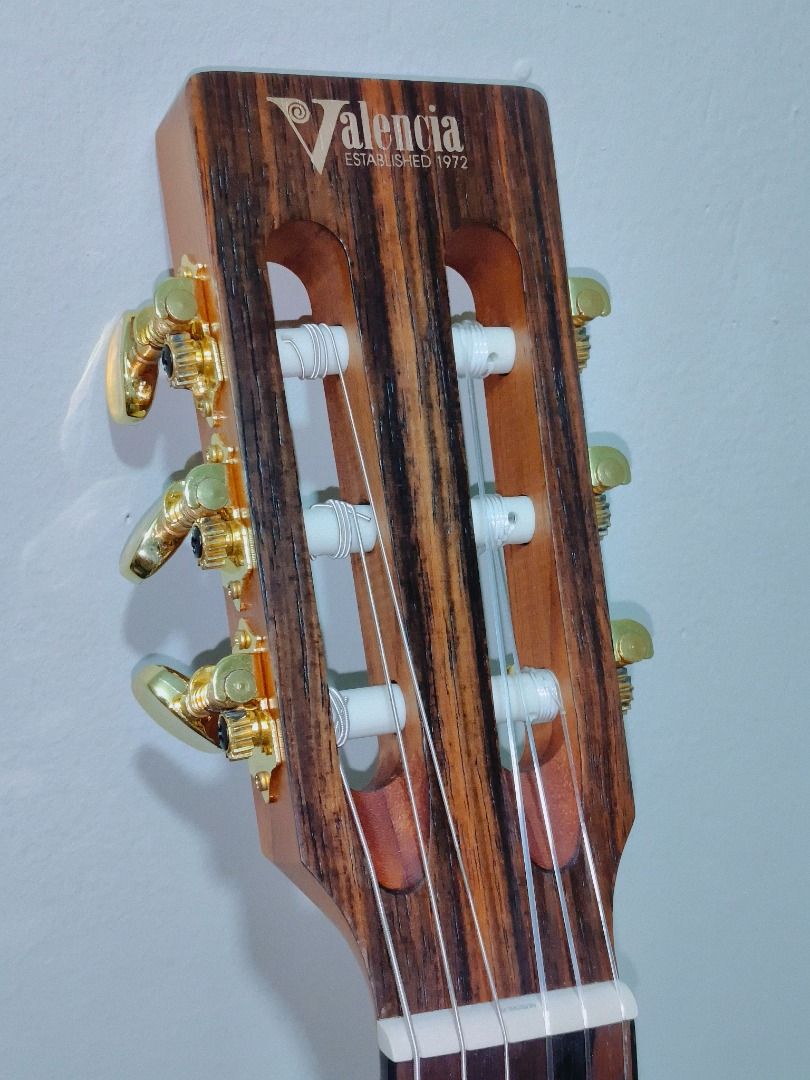 Valencia Classical Guitar (Auditorium) (Category: Musical Instruments) located in Marikina City. Submitted by jamvg (Listing ID 1460482038, Image 2). Description: •Nut width: 48mm •Solid cedar top •Arched back •Two-way truss rod •With original box •and Original hex key Almost brand new with newly replaced strings since September 13 Negotiable I have 4 videos of playing/demonstration. Just dm me..