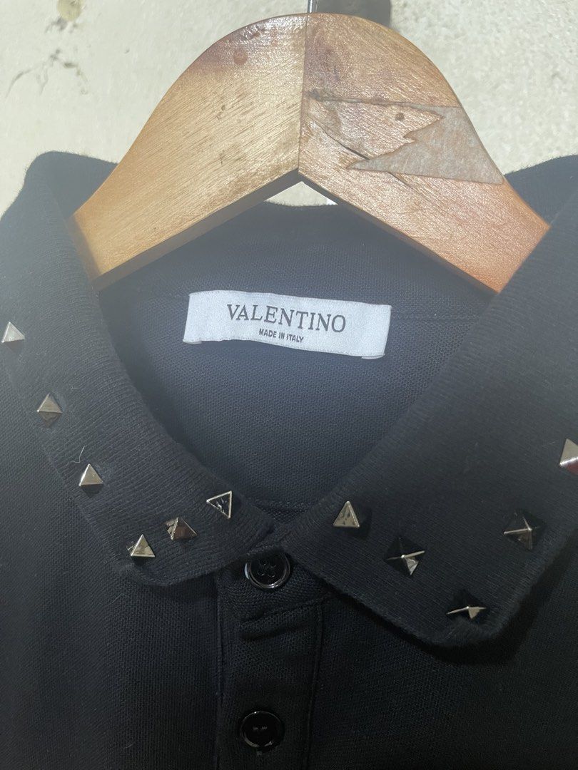 Valentino Spike Polo Shirt (Category: Activewear) located in Tuguegarao City. Submitted by elyks11 (Listing ID 1460326615, Image 2). Description: VALENTINO ICONIC POLO SHIRT SOLID NG DETAILS LAKAS NG DATING.