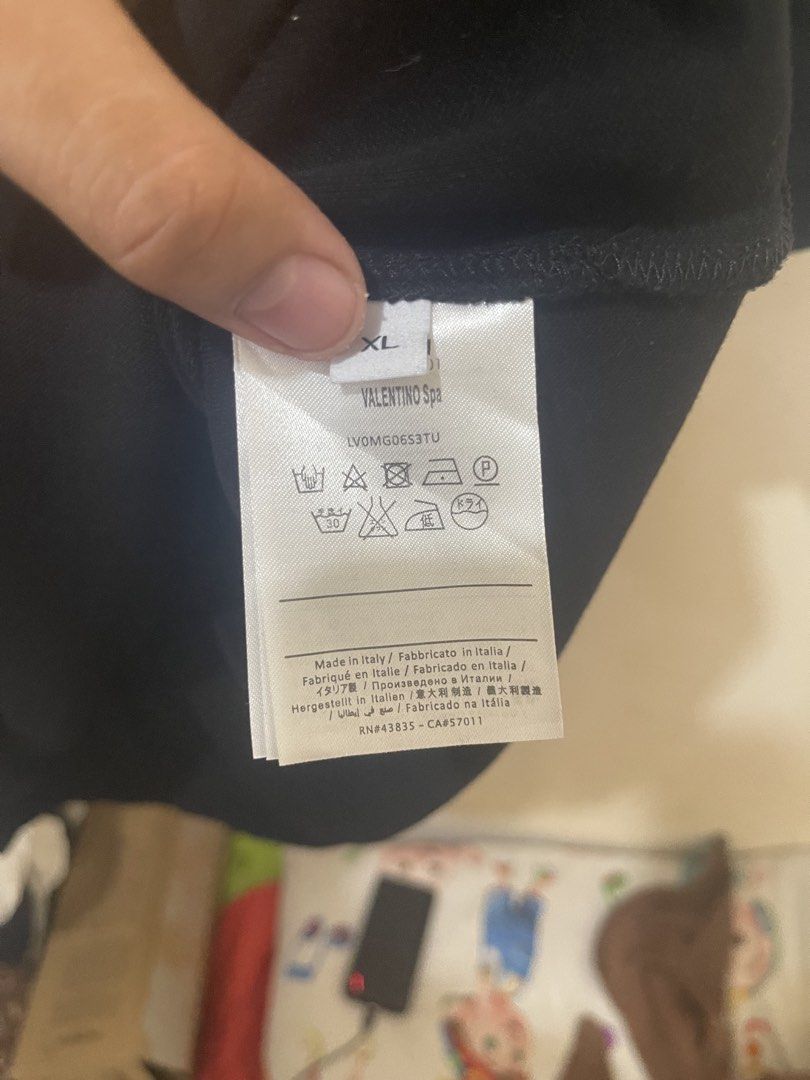 Valentino Spike Polo Shirt (Category: Activewear) located in Tuguegarao City. Submitted by elyks11 (Listing ID 1460326615, Image 3). Description: VALENTINO ICONIC POLO SHIRT SOLID NG DETAILS LAKAS NG DATING.