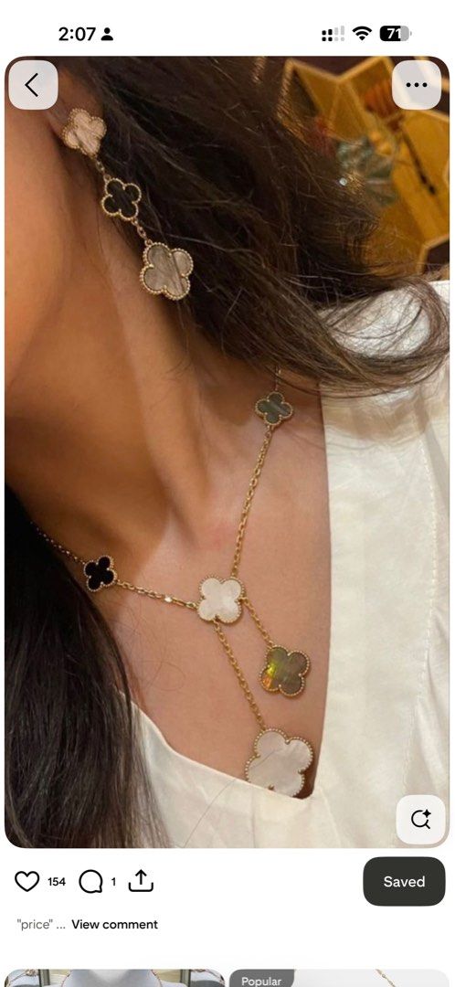 Van Cleef & Arpels Inspired Clover Necklace and Earrings Set (Category: Necklaces) located in Cainta. Submitted by lovelymart00300 (Listing ID 1460401139, Image 1). Description: - Beautiful clover motif necklace and matching earrings. - Features genuine mother of pearl, onyx, and malachite stones. - Elegant gold-tone chain. - Adds a touch of luxury to any outfit. - Versatile for dressing up or down. - Makes a wonderful gift idea..